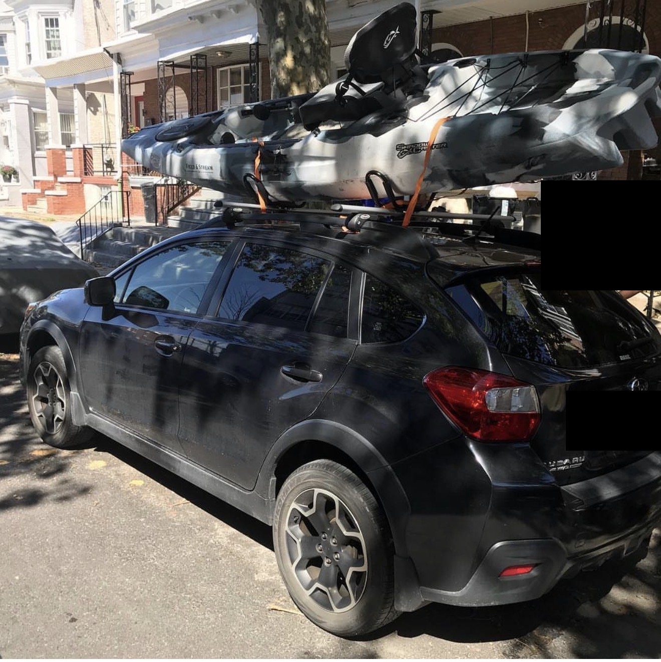 Subaru Crosstrek with kayak, camo pattern