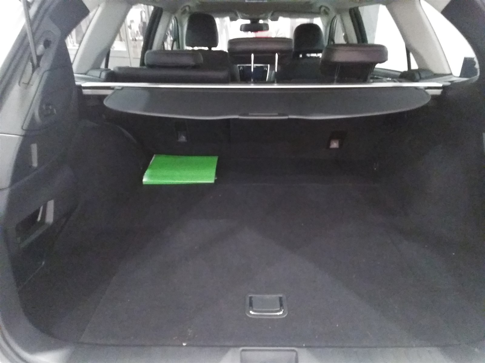 Empty Subaru Outback cargo area with rear seats visible