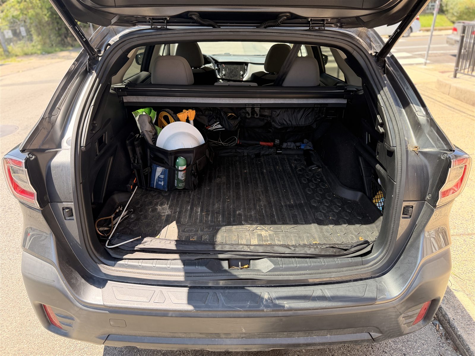 Collapsible cargo organizer in use in a Subaru Outback trunk